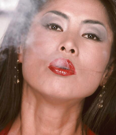 Inviting asian mature Minka enjoys smoking 