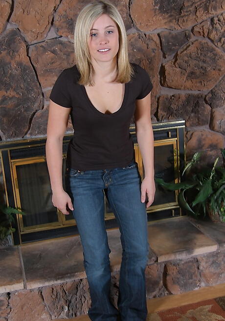 Slim blonde young Taylor showing small tits and spreading her legs 